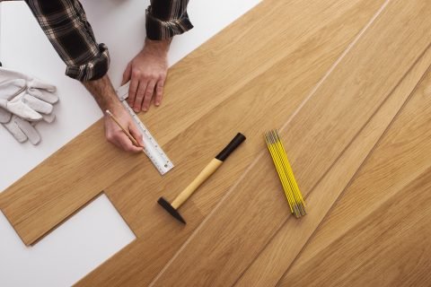 hardwood-flooring-being-installed-1500