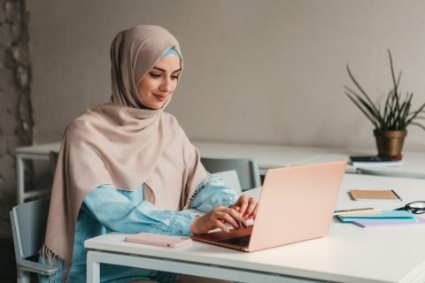 young-pretty-modern-muslim-woman-hijab-working-laptop-office-room-education-online Online Drivers Education Service in Calabasas, CA